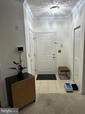 a living room with furniture and a shower