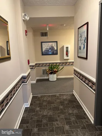 a room with a table and chairs