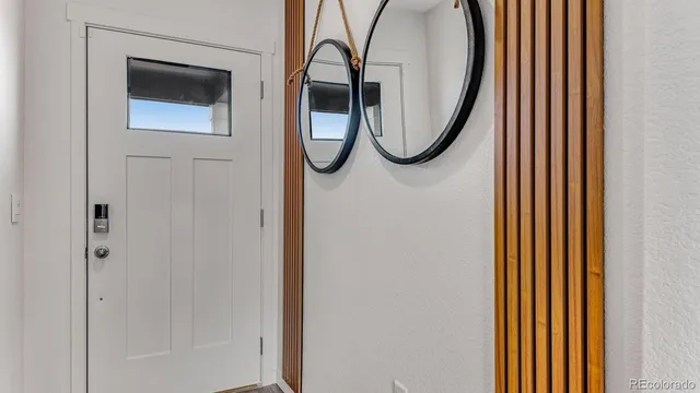 a view of a entryway with wooden floor