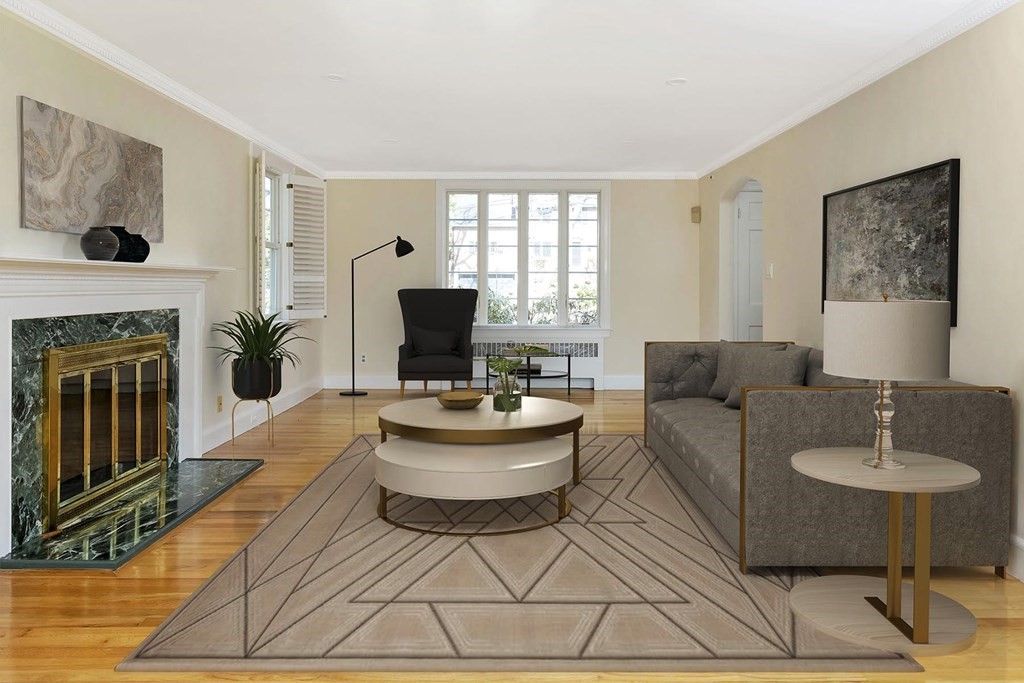 20 Kewadin Road Newton, MA 02468 - Photo 2 of 23 a living room with furniture a fireplace and a table