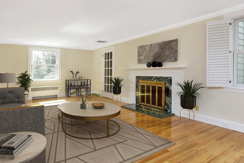 20 Kewadin Road Newton, MA 02468 - Photo 3 of 23 a living room with furniture and a fireplace