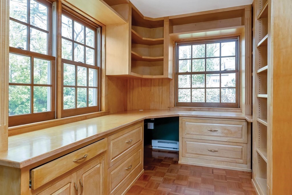 20 Kewadin Road Newton, MA 02468 - Photo 10 of 23 a kitchen with granite countertop a large window and a sink