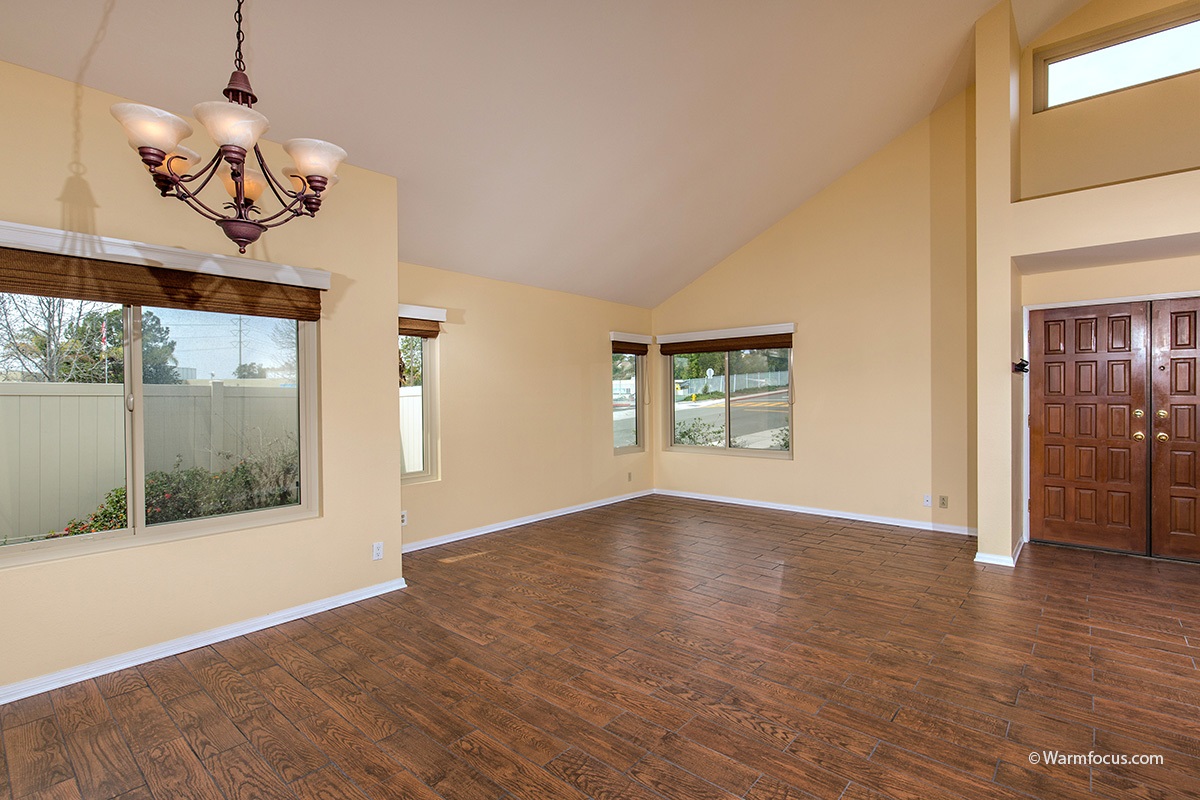 1604 Splitrail Drive Encinitas, CA 92024 - Photo 2 of 25 Bright, open living room with new flooring, new windows and shades, and lots of natural light.
