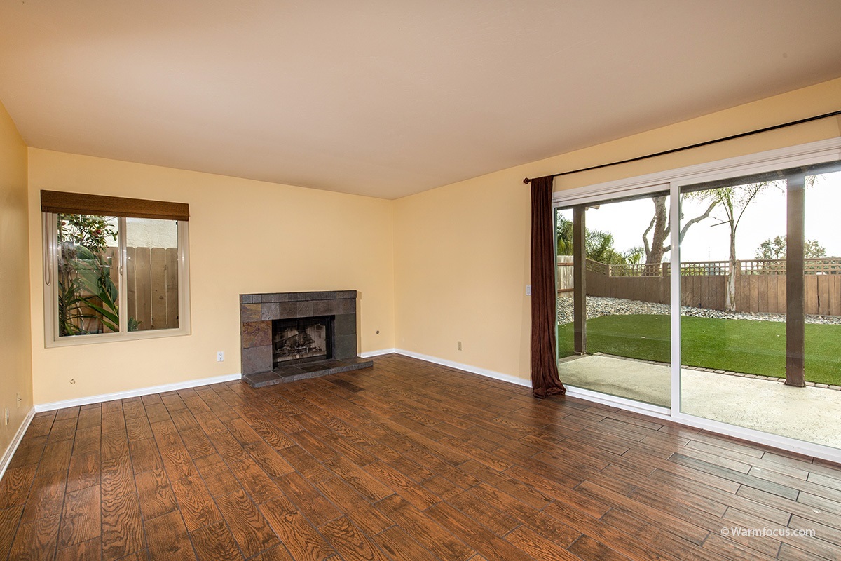 1604 Splitrail Drive Encinitas, CA 92024 - Photo 15 of 25 Family room has a cozy fireplace.