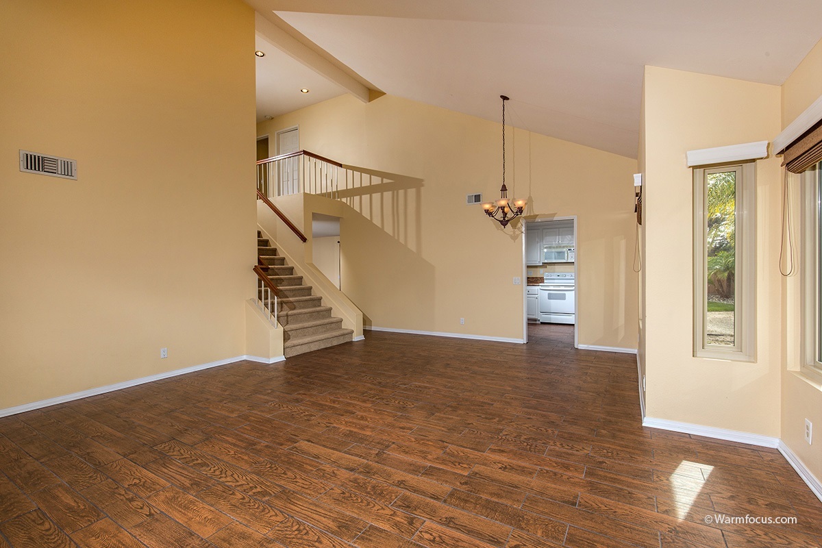 1604 Splitrail Drive Encinitas, CA 92024 - Photo 4 of 25 Door from the dining room to the kitchen. Note the wide staircase!