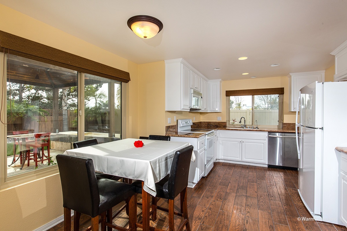 1604 Splitrail Drive Encinitas, CA 92024 - Photo 8 of 25 Eat-in kitchen has a large window to view the back yard.