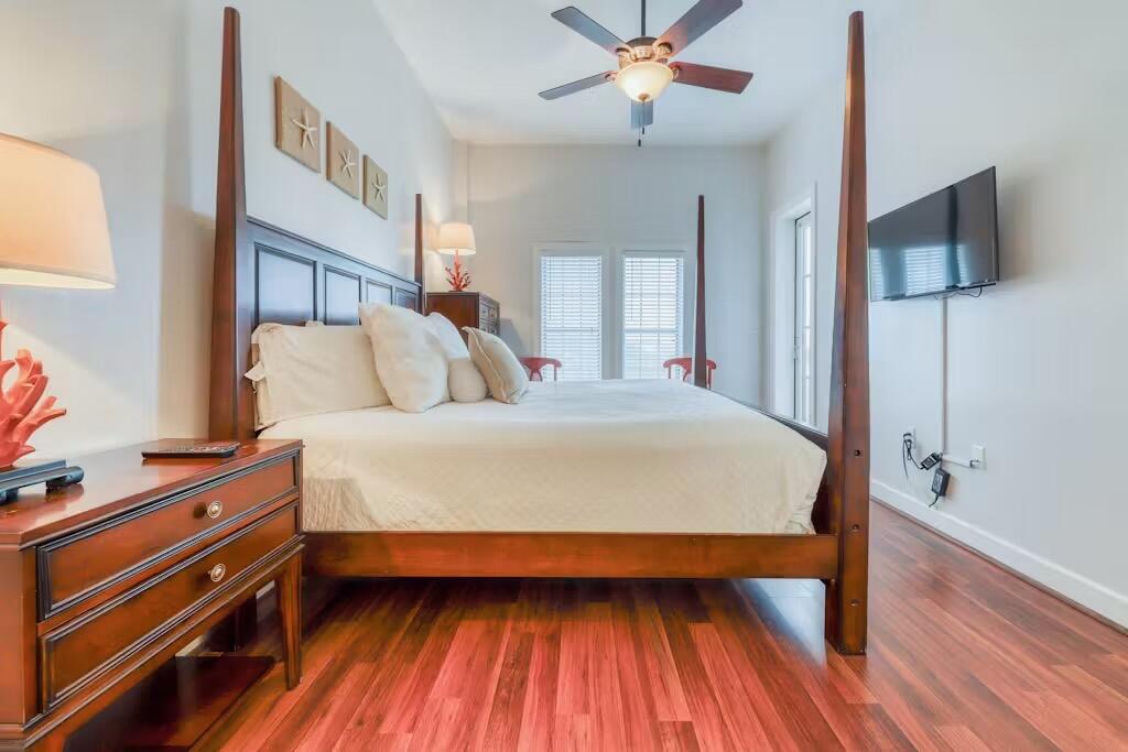 10343 East County Highway 30A, Unit 328 Inlet Beach, FL 32413 - Photo 6 of 16 a bed room with a bed and a chandelier