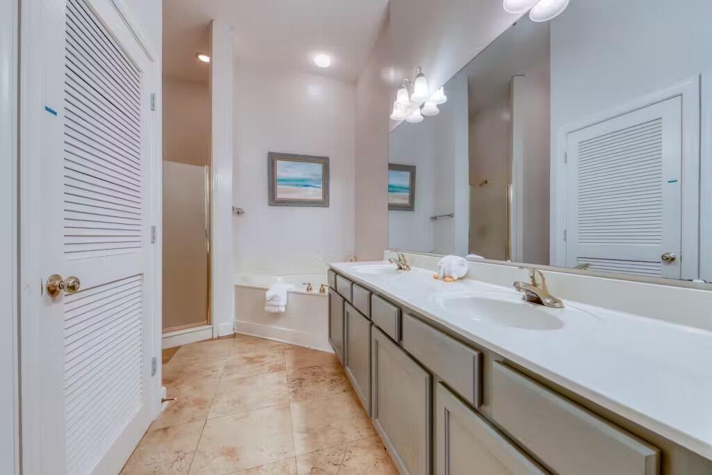 10343 East County Highway 30A, Unit 328 Inlet Beach, FL 32413 - Photo 8 of 16 a bathroom with a sink a toilet and shower