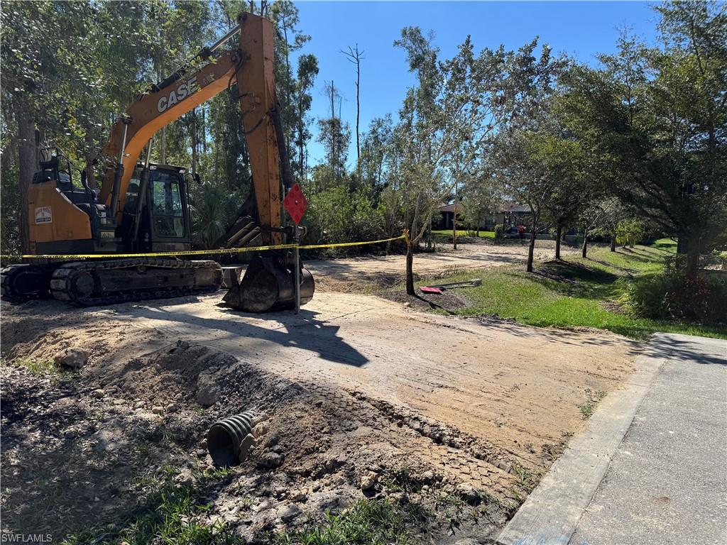 16398 Aberdeen Way Naples, FL 34110 - Photo 3 of 5 a view of a park with large trees