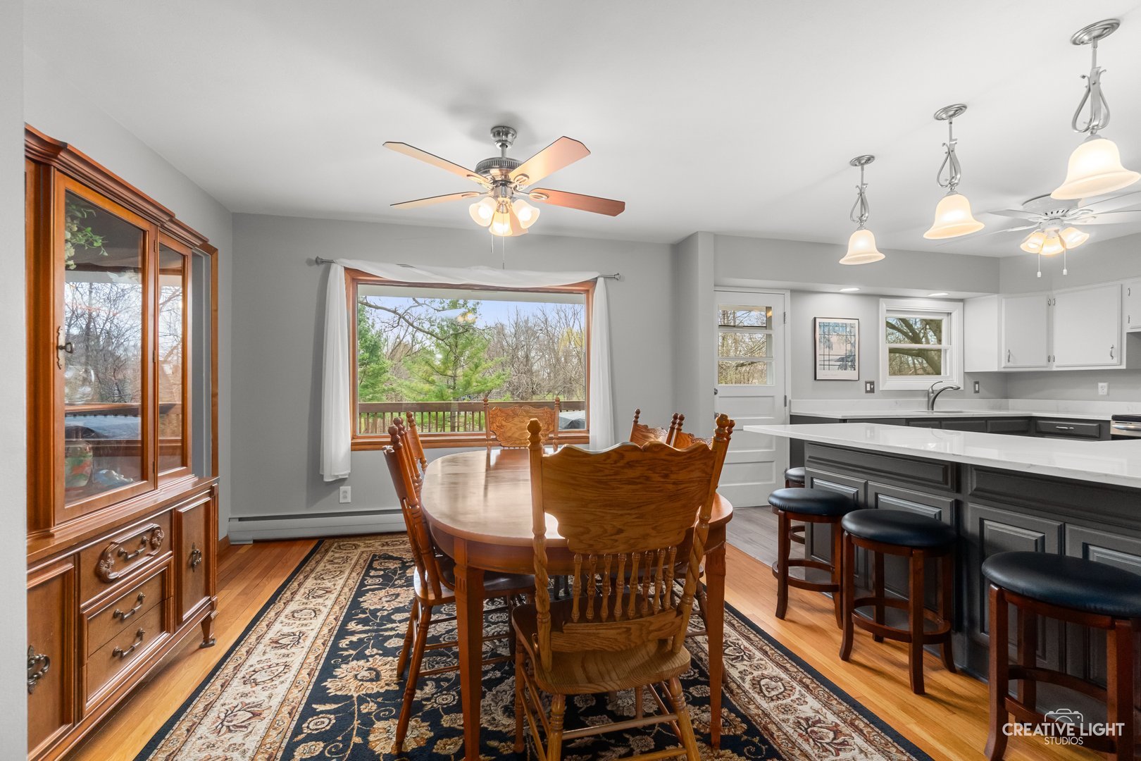 1005 Meadow Lane Elgin, IL 60123 - Photo 5 of 22 a view of a dining room with furniture window and wooden floor