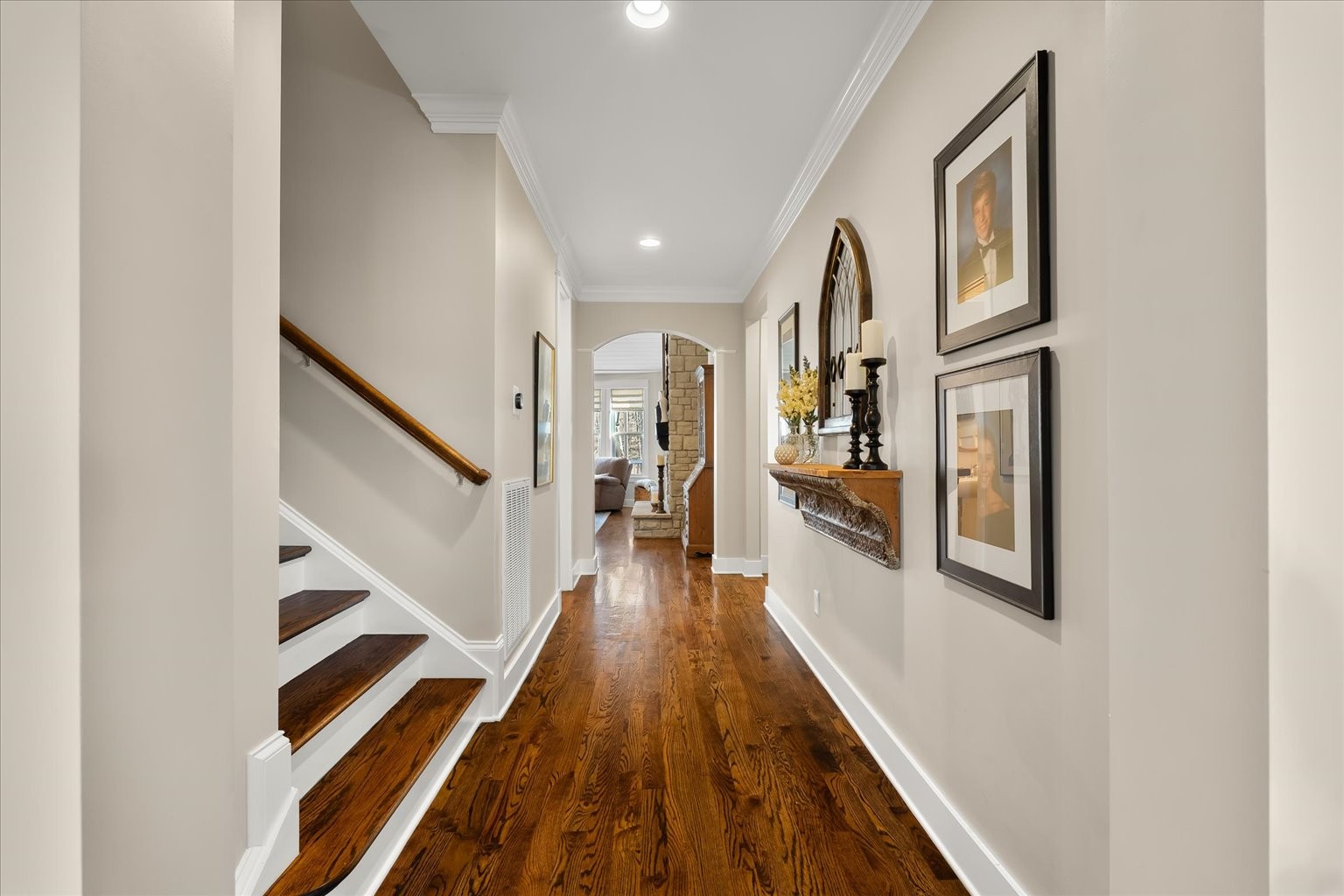 6833 Falls Ridge Lane College Grove, TN 37046 - Photo 13 of 70 a view of a hallway with wooden floor and staircase