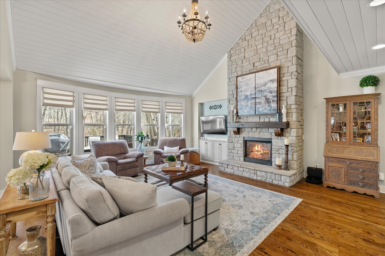 6833 Falls Ridge Lane College Grove, TN 37046 - Photo 16 of 70 a living room with fireplace furniture and a floor to ceiling window