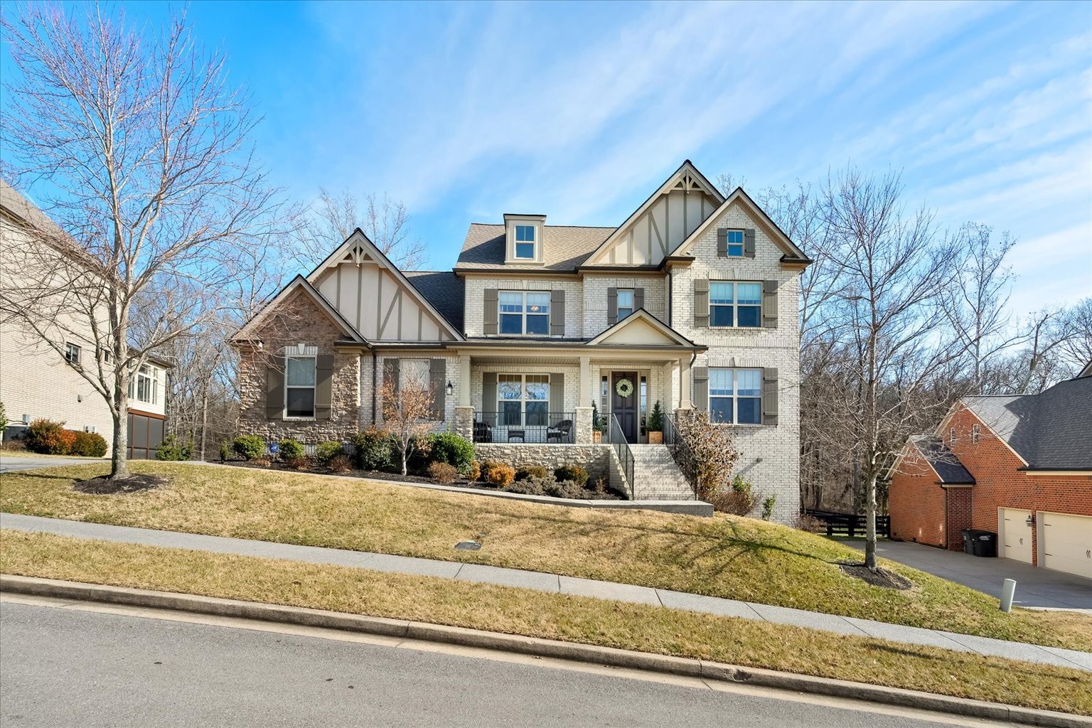 6833 Falls Ridge Lane College Grove, TN 37046 - Photo 2 of 70 a front view of house with a yard