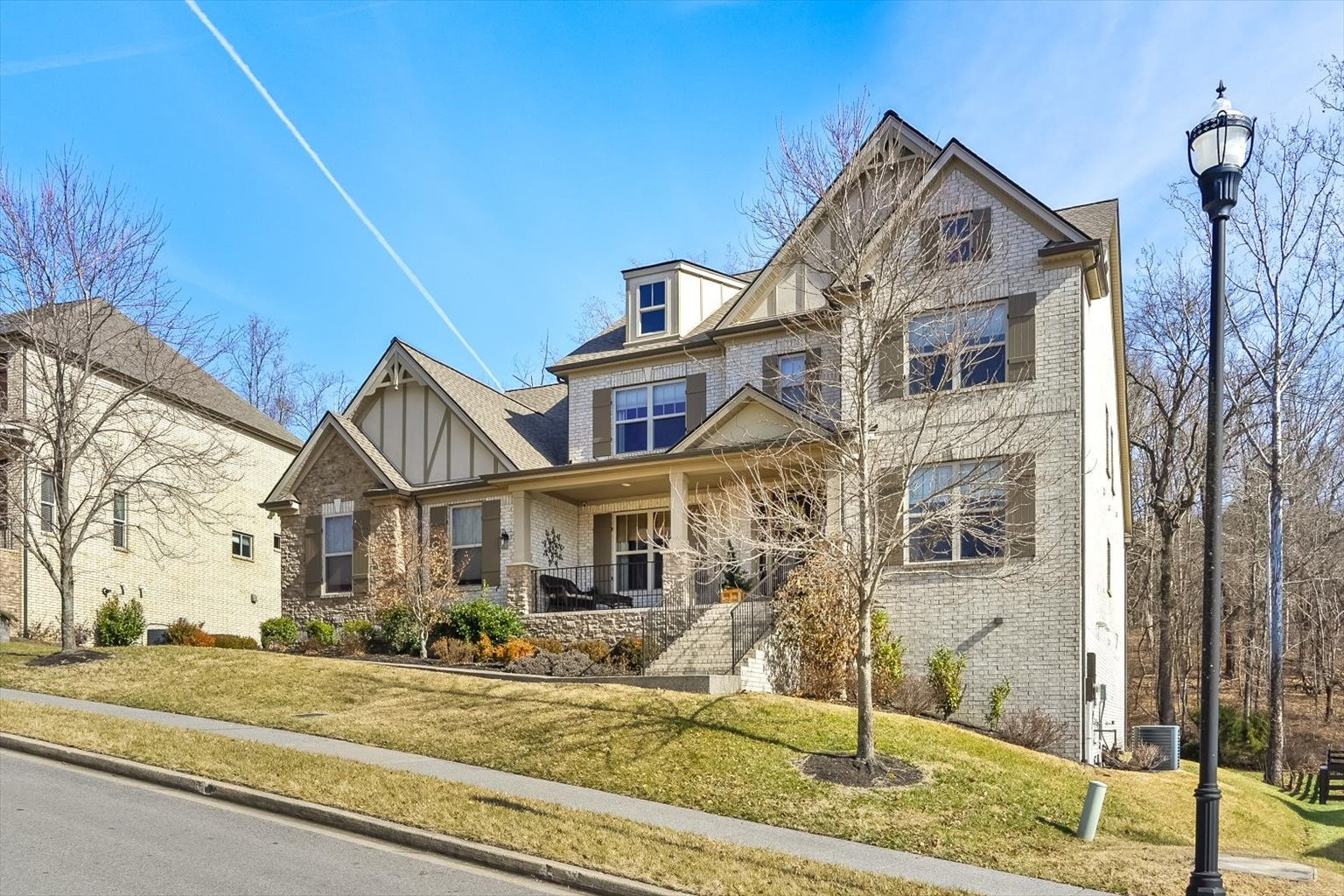 6833 Falls Ridge Lane College Grove, TN 37046 - Photo 3 of 70 front view of a house with a street