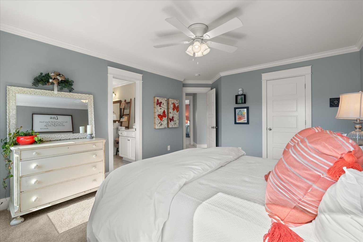 6833 Falls Ridge Lane College Grove, TN 37046 - Photo 53 of 70 a bedroom with a bed and a chandelier