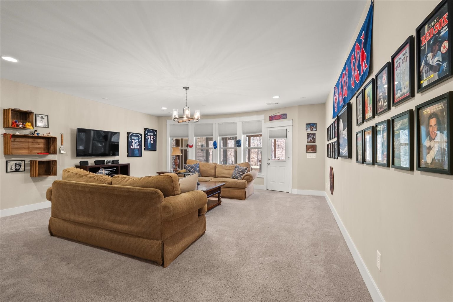 6833 Falls Ridge Lane College Grove, TN 37046 - Photo 55 of 70 a living room with furniture and a flat screen tv