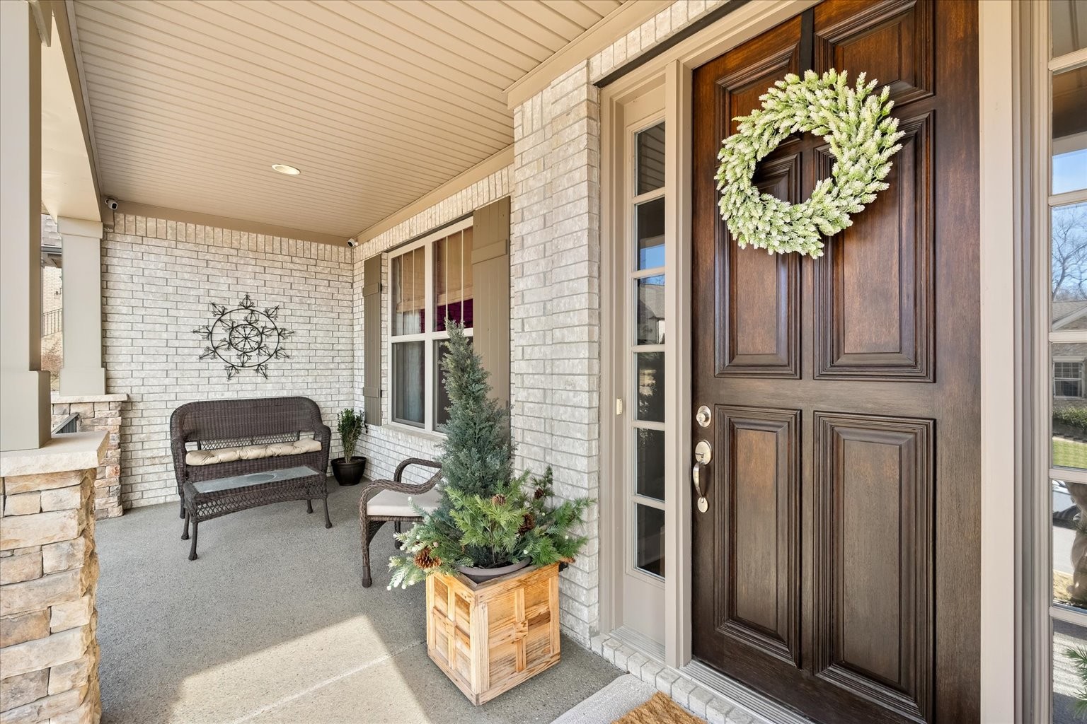 6833 Falls Ridge Lane College Grove, TN 37046 - Photo 6 of 70 a balcony with furniture and a potted plant