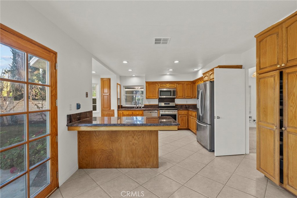 25550 Old Course Way Valencia, CA 91355 - Photo 17 of 48 From Family room to Kitchen