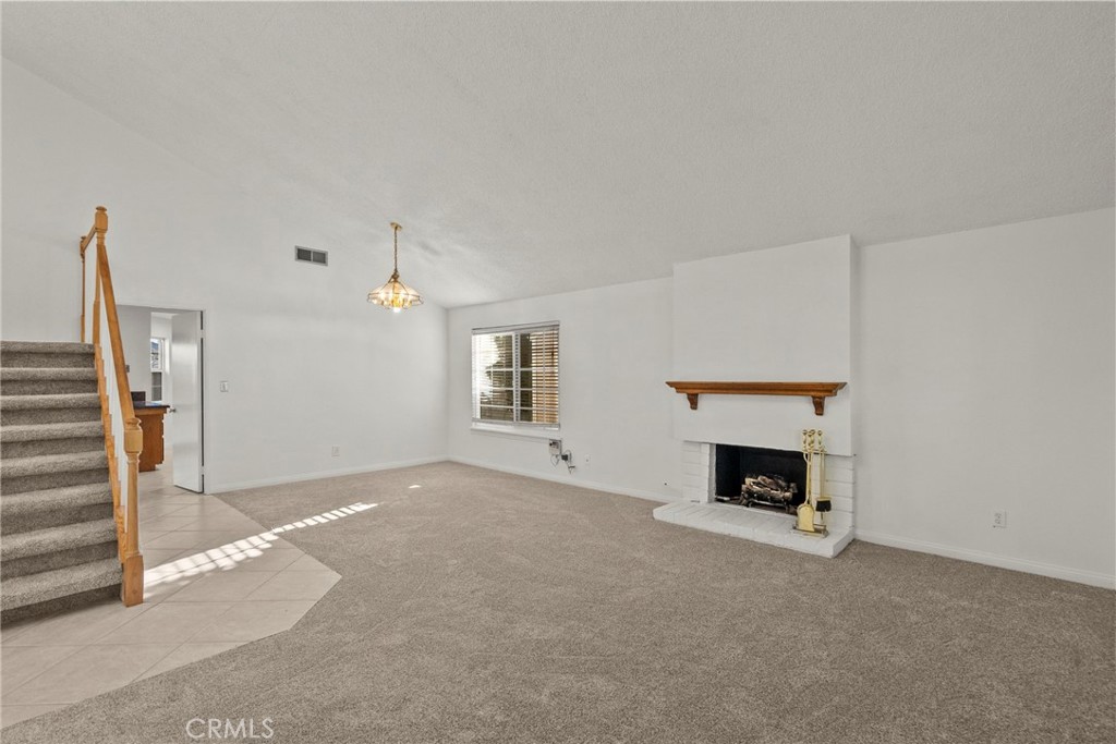 25550 Old Course Way Valencia, CA 91355 - Photo 7 of 48 Family room w fireplace