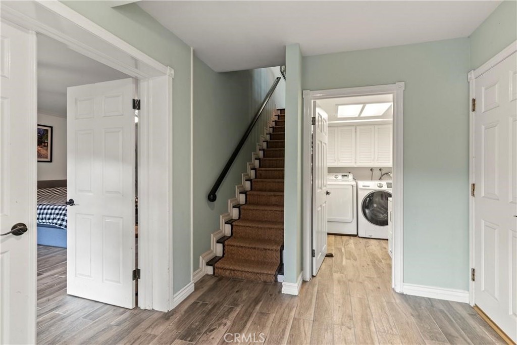 6608 Via Siena Rancho Palos Verdes, CA 90275 - Photo 29 of 52 a view of a hallway with wooden floor and entryway