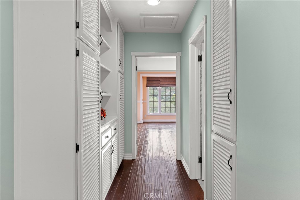 6608 Via Siena Rancho Palos Verdes, CA 90275 - Photo 30 of 52 a view of a hallway with wooden floor and staircase