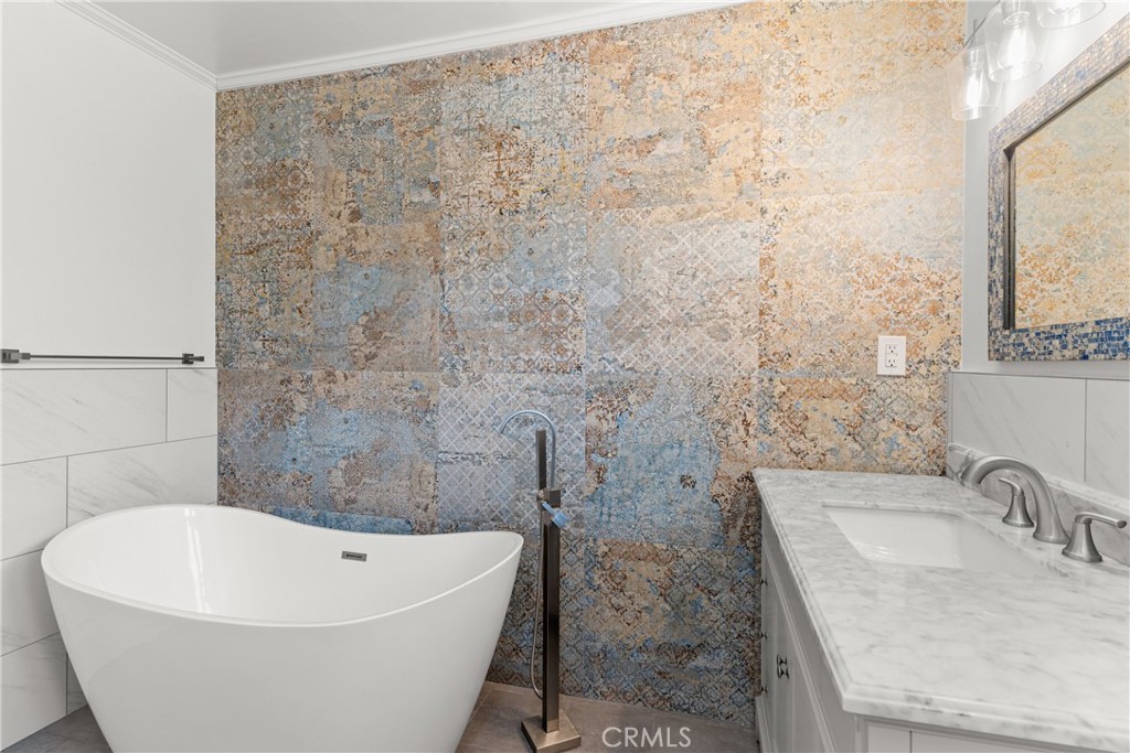 6608 Via Siena Rancho Palos Verdes, CA 90275 - Photo 32 of 52 a bathroom with a bathtub and shower