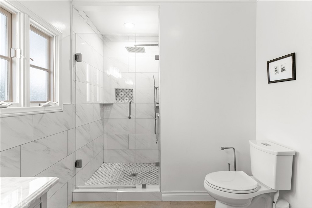 6608 Via Siena Rancho Palos Verdes, CA 90275 - Photo 33 of 52 a bathroom with a toilet and a shower