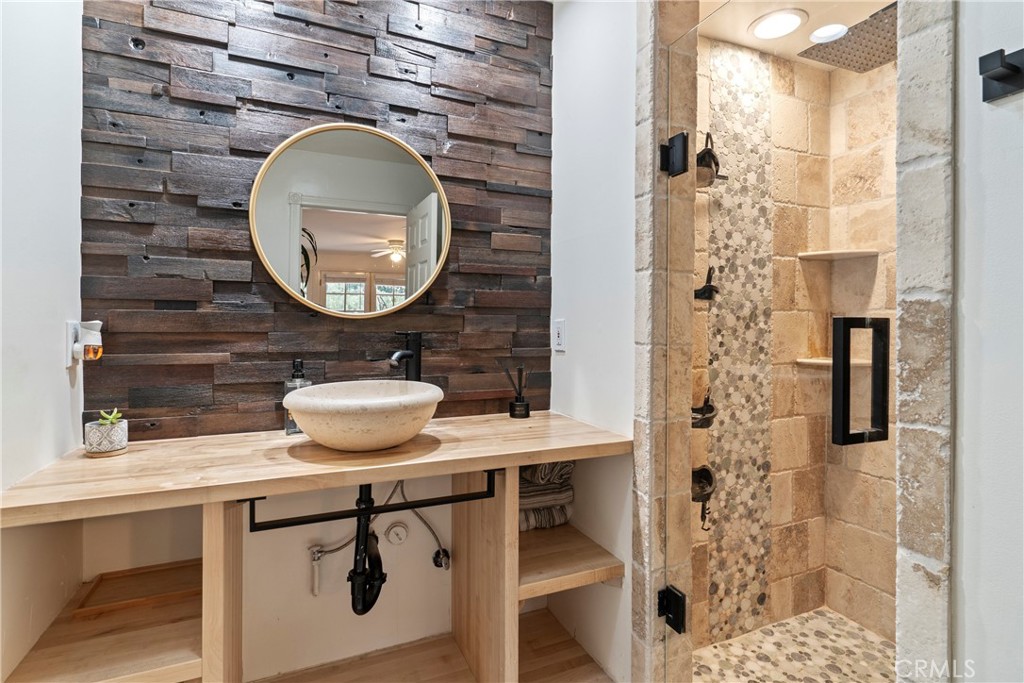6608 Via Siena Rancho Palos Verdes, CA 90275 - Photo 34 of 52 a bathroom with a sink and a mirror