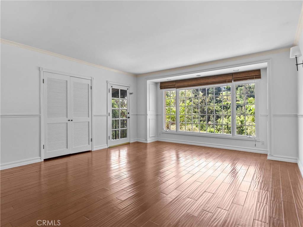 6608 Via Siena Rancho Palos Verdes, CA 90275 - Photo 42 of 52 a view of an empty room with wooden floor and a window