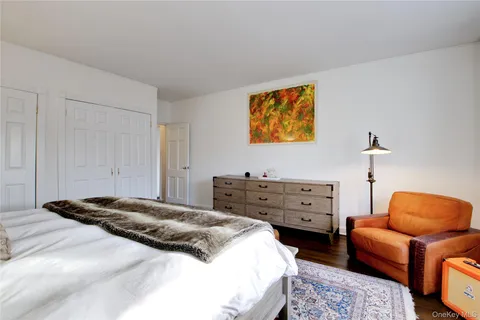 a bedroom with a bed and furniture