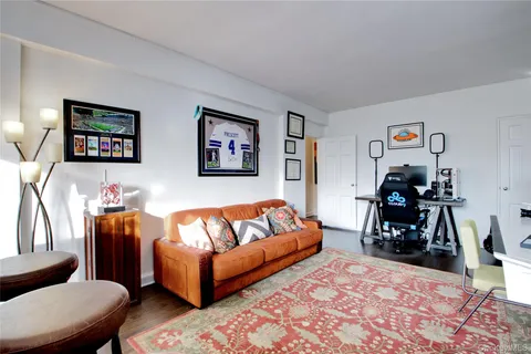 a living room with furniture and a couch