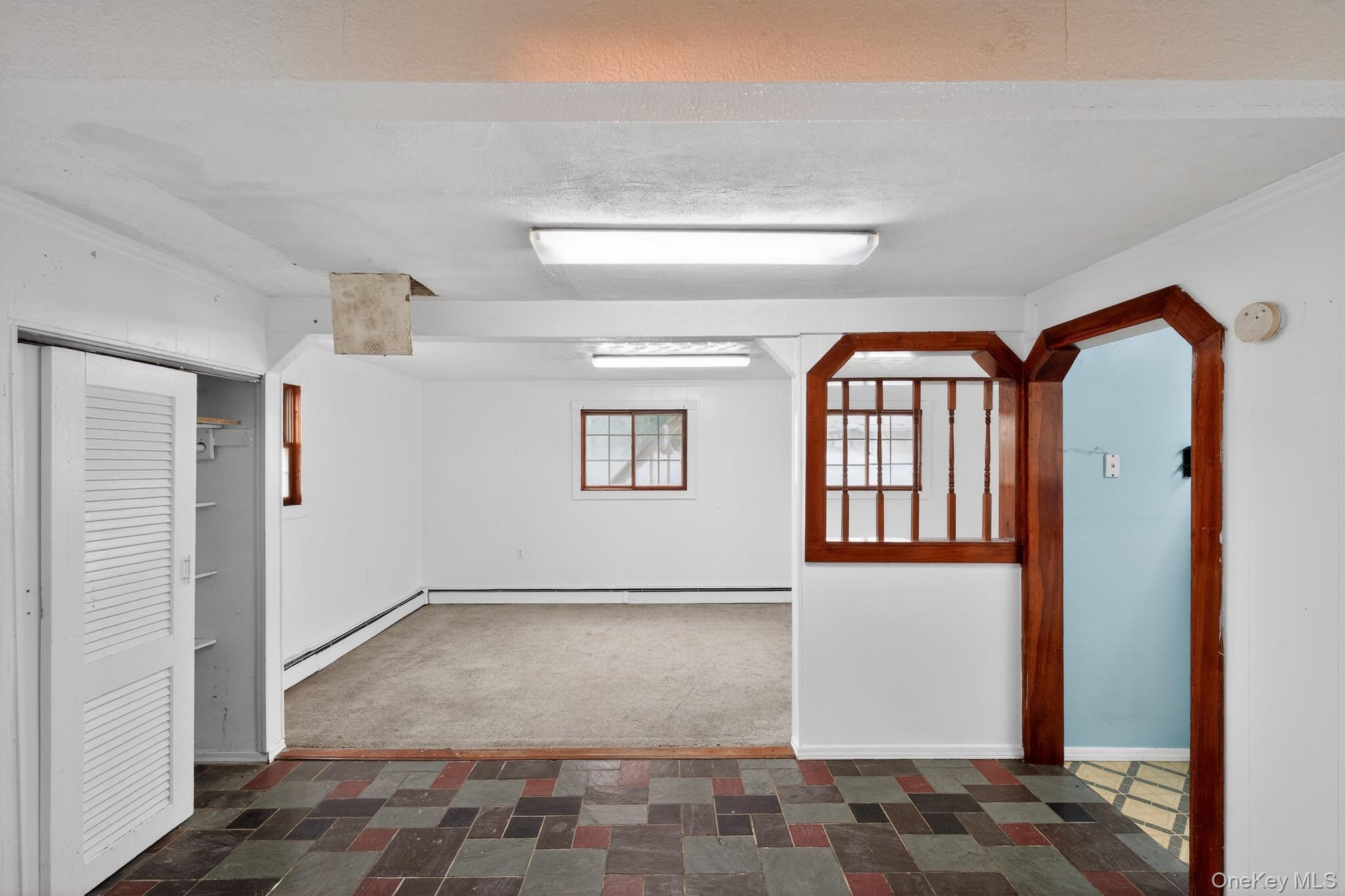 138 Spring Street Massapequa, NY 11758 - Photo 40 of 45 a view of an entryway with a window