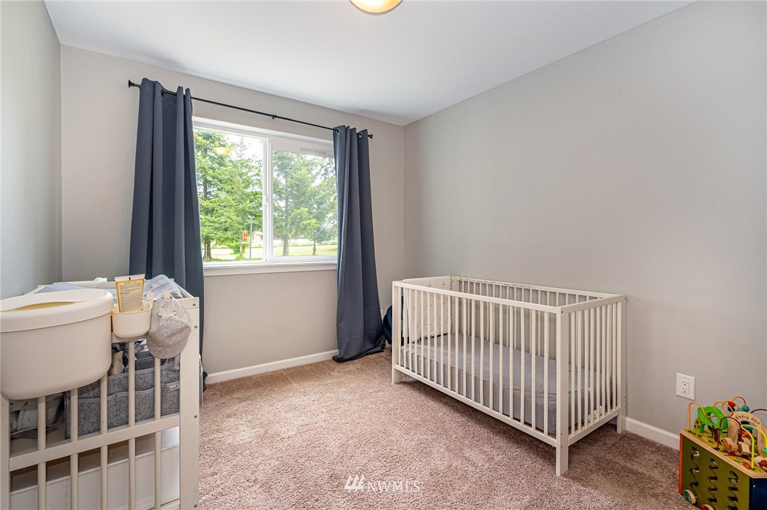 665 Rhoades Road Winlock, WA 98596 - Photo 20 of 39 a view of a room with furniture and windows