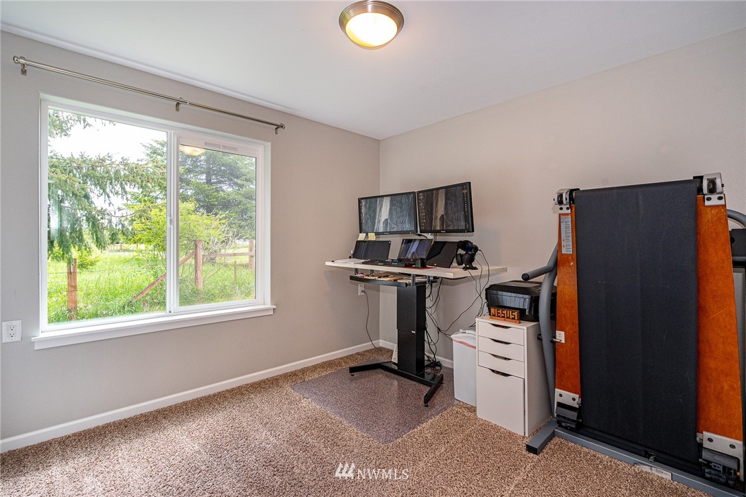 665 Rhoades Road Winlock, WA 98596 - Photo 34 of 39 a view of a workspace with furniture and a window
