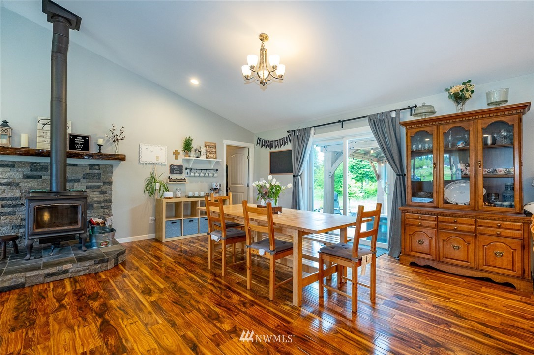 665 Rhoades Road Winlock, WA 98596 - Photo 7 of 39 a view of a dining room with furniture window and wooden floor