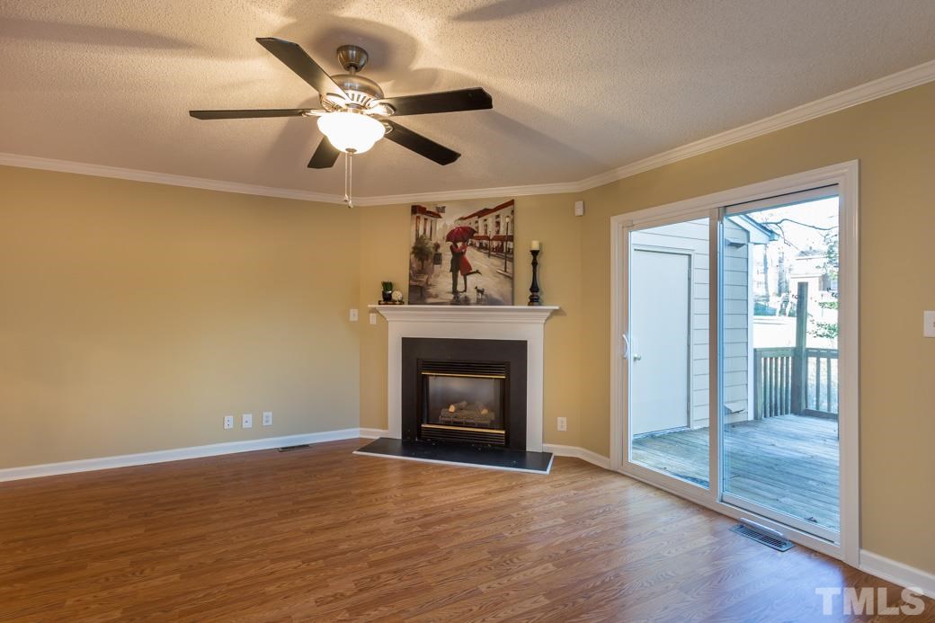 4416 Antique Lane Raleigh, NC 27616 - Photo 3 of 10 Large living room with gas log FIREPLACE!