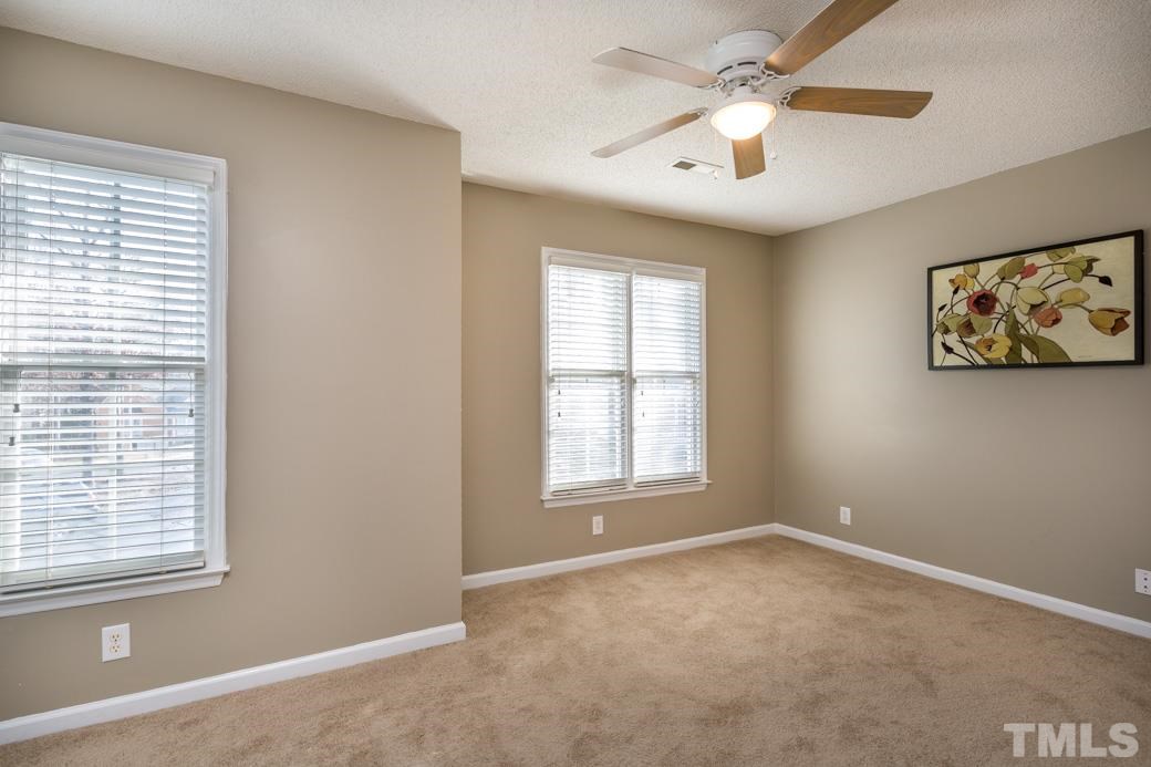 4416 Antique Lane Raleigh, NC 27616 - Photo 8 of 10 The second bedroom has private EN SUITE bath with UPDATED fixtures. Fantastic for a roommate situation!