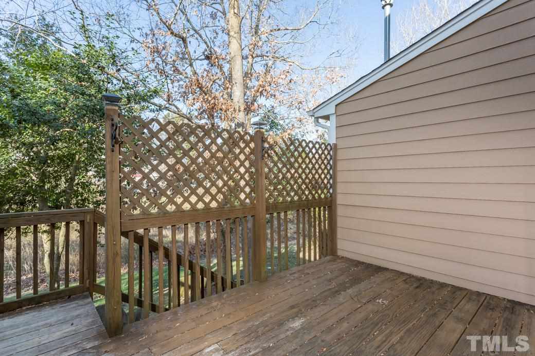 4416 Antique Lane Raleigh, NC 27616 - Photo 10 of 10 PRIVATE back deck with OUTSIDE STORAGE & PEACEFUL WOODED VIEWS. Water hose hook up and plenty of room for your GRILL!