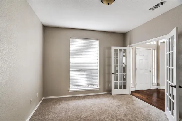 an empty room with windows