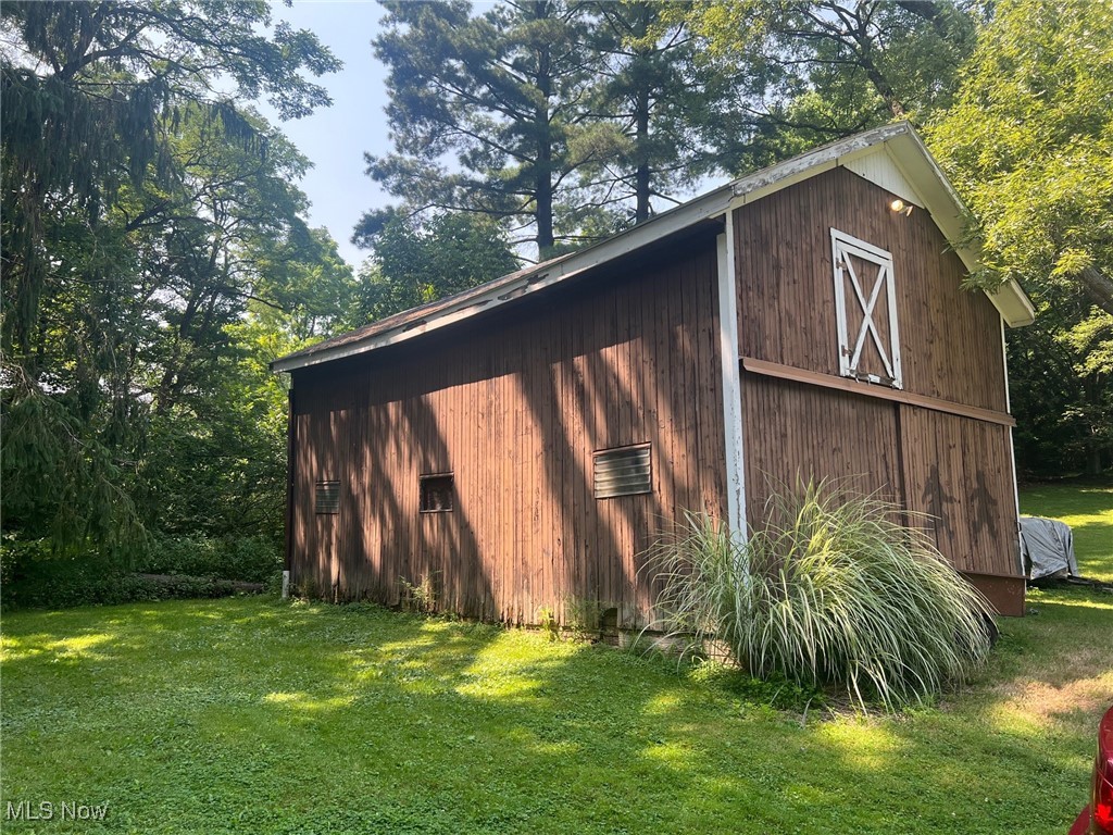 10504 Mulberry Road Chardon, OH 44024 - Photo 7 of 23 View of barn with a yard and view of scattered trees