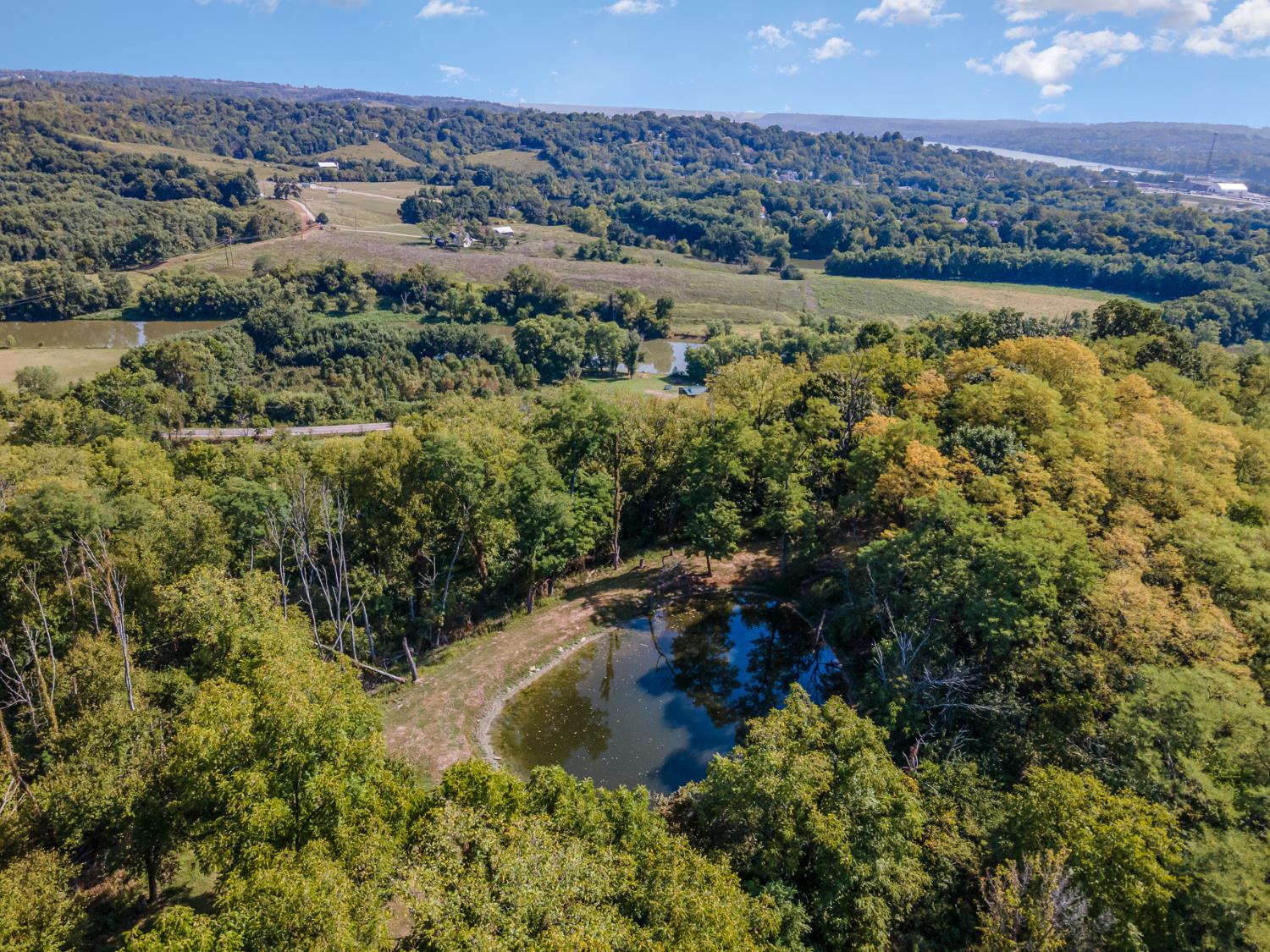 5143 North Hogan Road Aurora, IN 47001 - Photo 1 of 24 11.097 acres with views overlooking downtown Aurora and the North Hogan Creek valley.