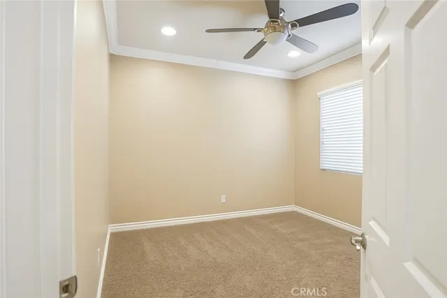 a bathroom with a toilet a sink and shower