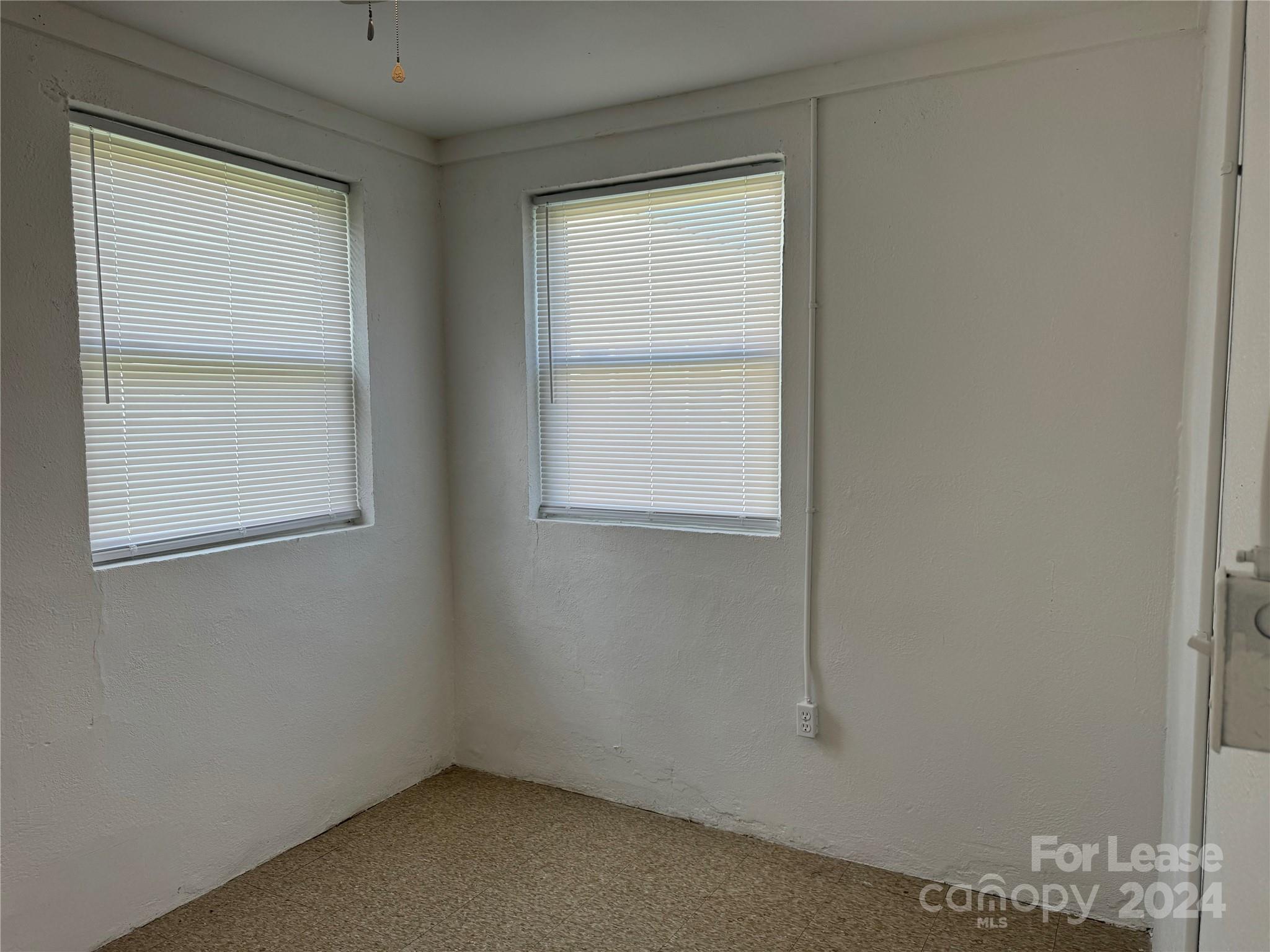 200 York Street, Unit O6 Chester, SC 29706 - Photo 12 of 13 an empty room with a window