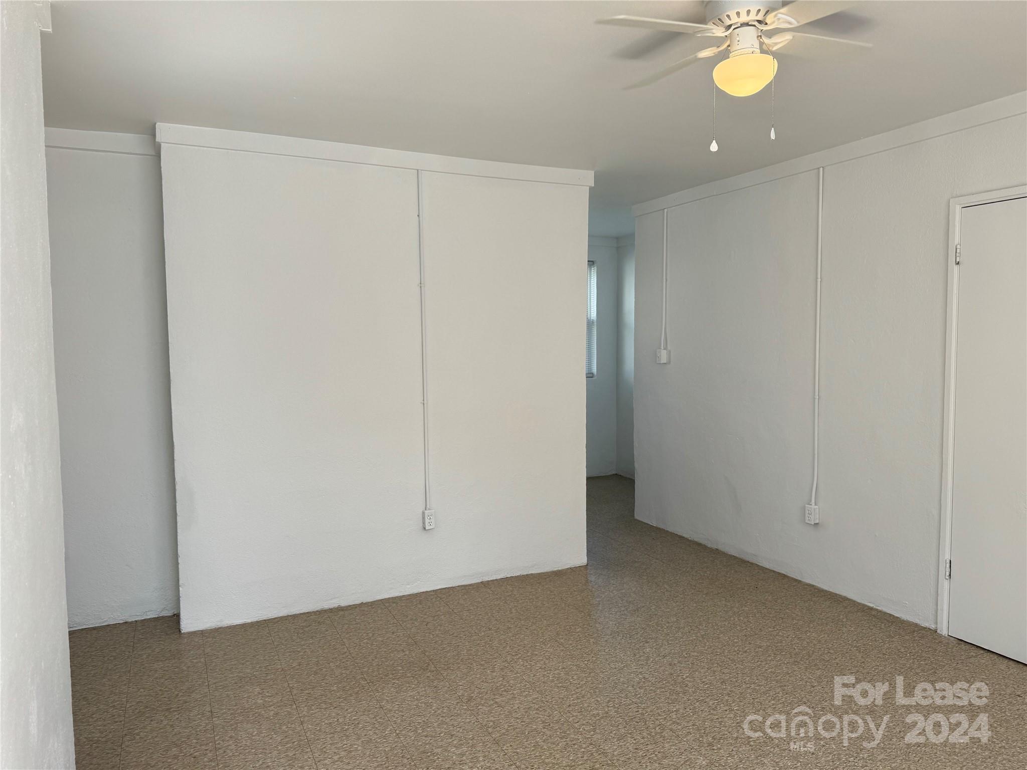 200 York Street, Unit O6 Chester, SC 29706 - Photo 4 of 13 a view of an empty room