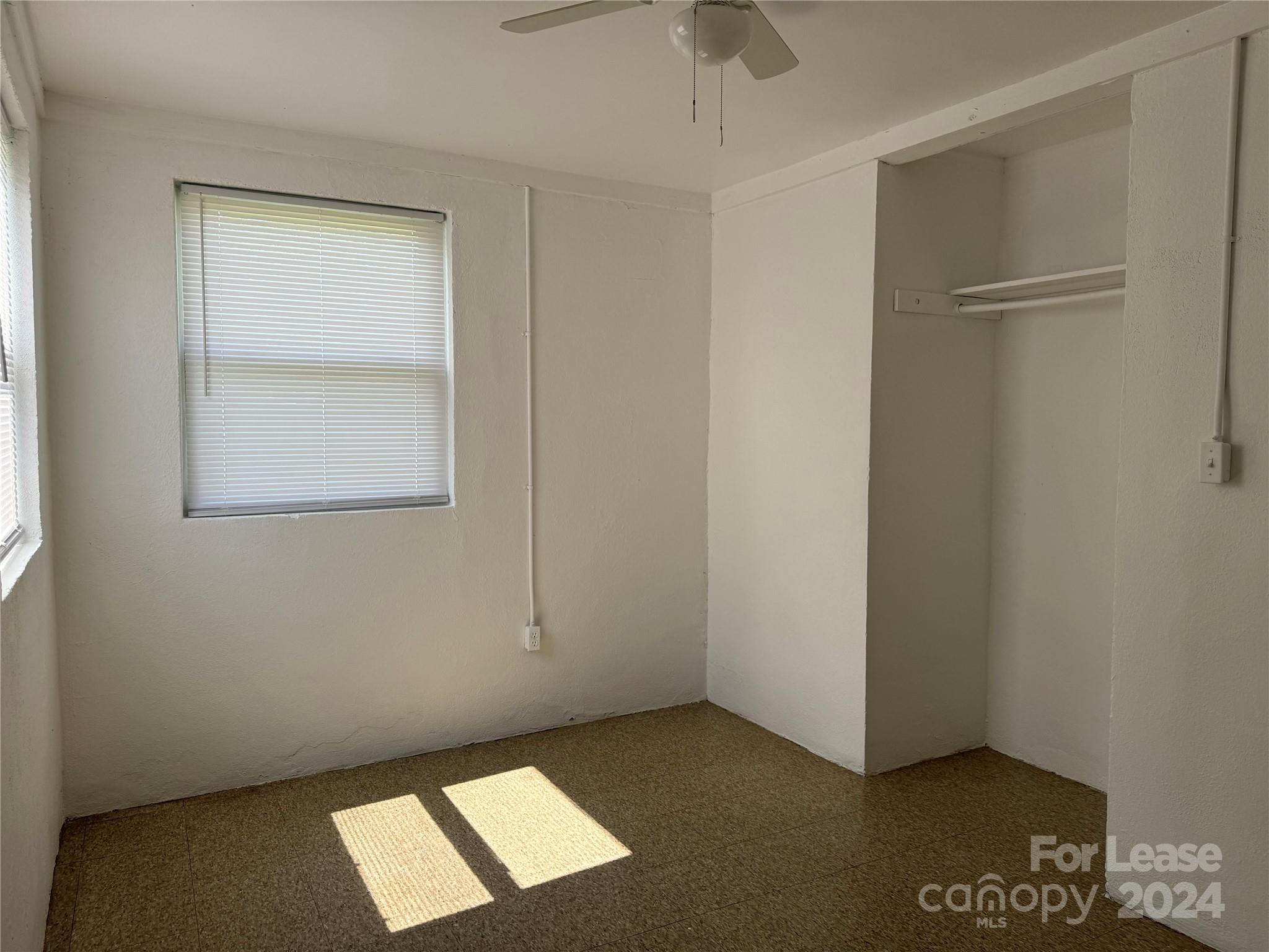 200 York Street, Unit O6 Chester, SC 29706 - Photo 8 of 13 a view of an empty room with a window