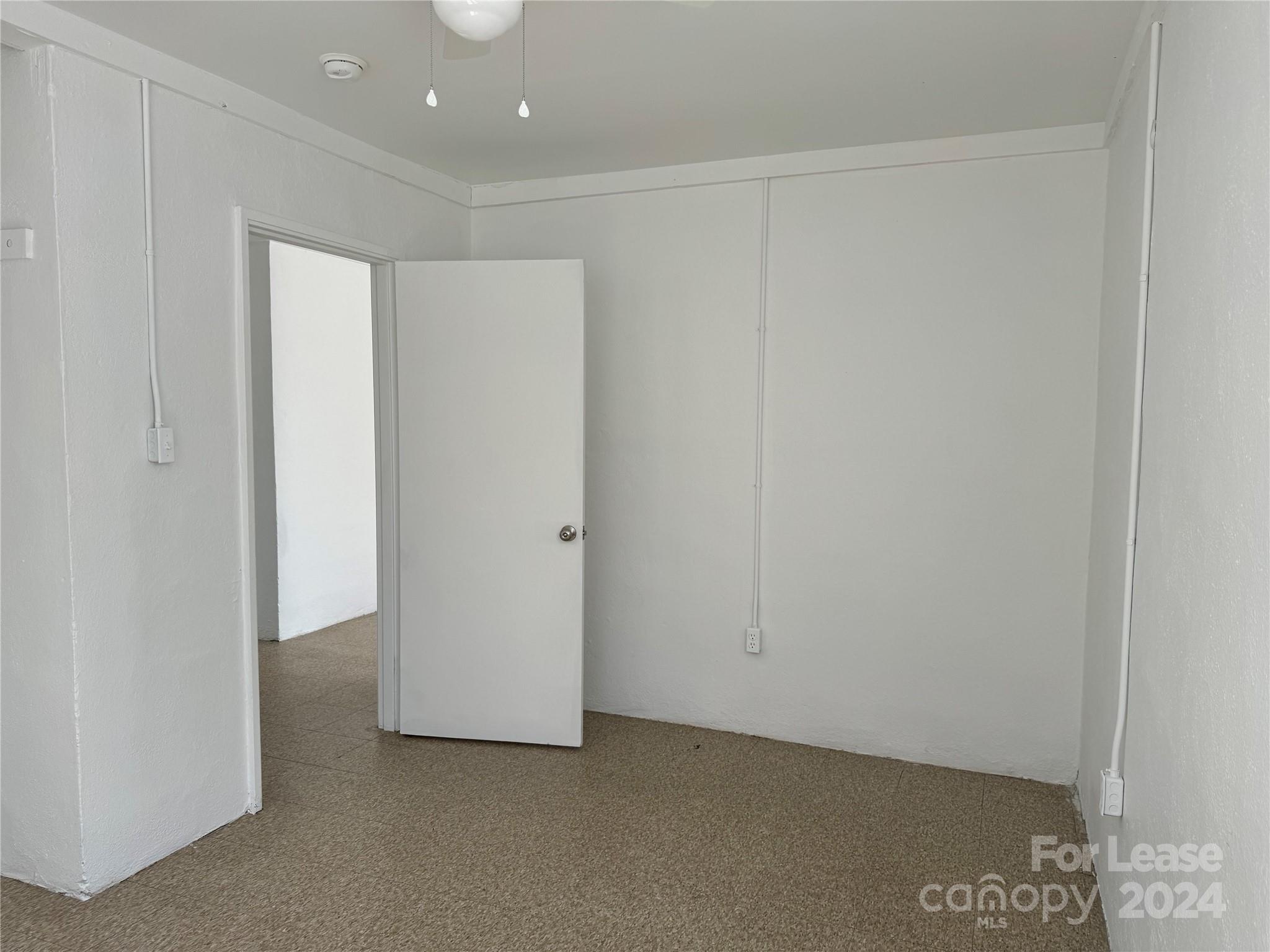 200 York Street, Unit O6 Chester, SC 29706 - Photo 9 of 13 a view of an empty room