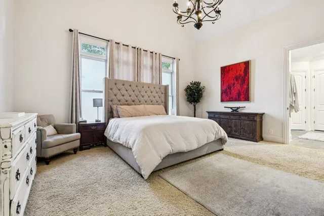 a bathroom with a tub and shower