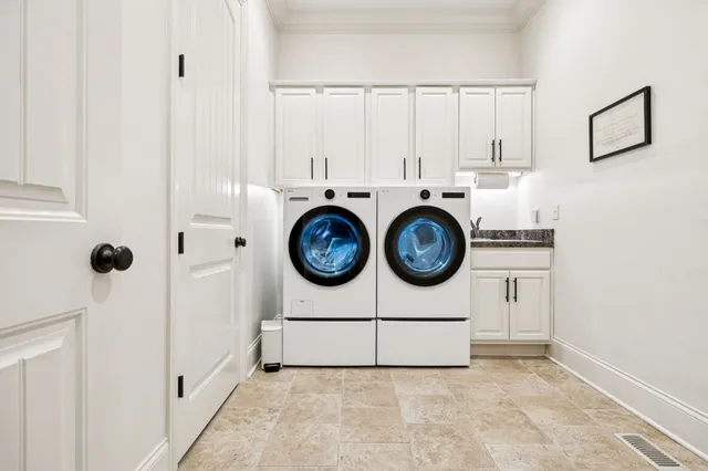 a bedroom with bed and furniture