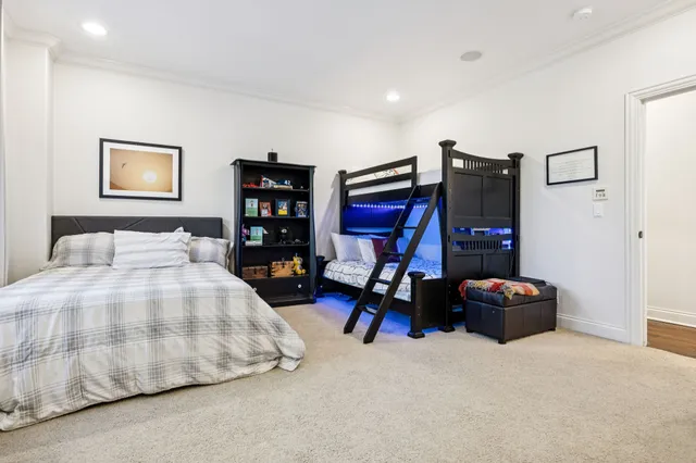 a bedroom with a bed and a cabinets