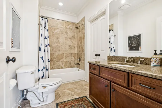 a kitchen with a sink a stove and a refrigerator